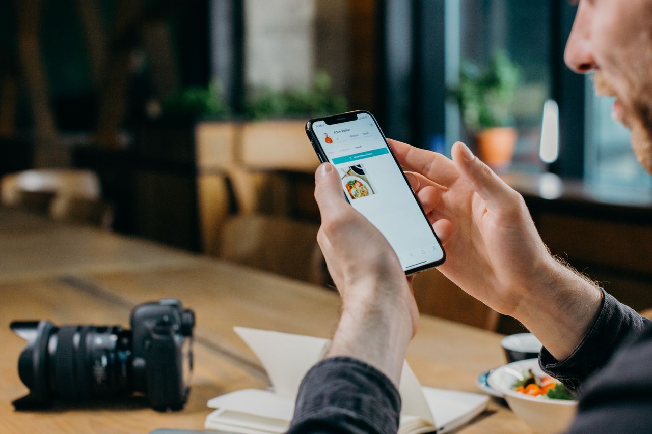 A person looking at a phone screen