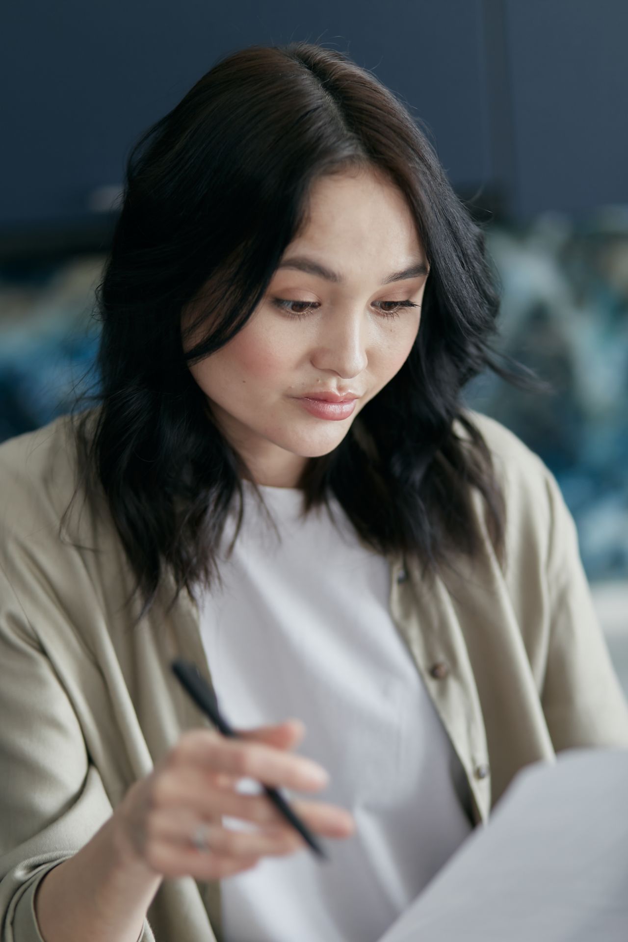 Reviewing a printed text at a desk