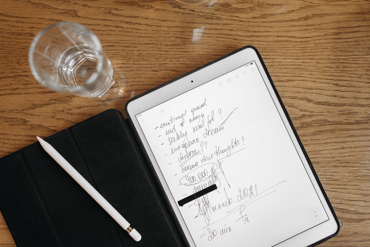 Handwritten notes on a tablet