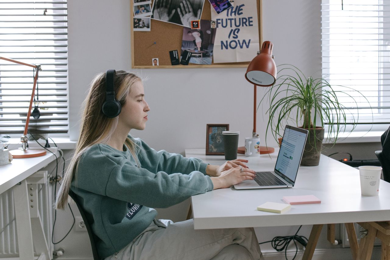 Focused work with headphones and a laptop